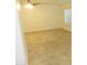 Bright and airy living room featuring neutral paint and tile floors with shuttered windows at 6242 E Hearn Rd, Scottsdale, AZ 85254