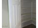 A bright, spacious pantry with built-in shelving for optimal storage at 6242 E Hearn Rd, Scottsdale, AZ 85254