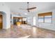 Kitchen features ceramic tile, oak cabinets, stainless steel appliances, breakfast bar, and modern light fixtures at 6439 W Adobe Dr, Glendale, AZ 85308