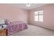 Cozy bedroom with soft, natural light, perfect for relaxation, reading or a quiet night's sleep at 6785 W Tether Trl, Peoria, AZ 85383