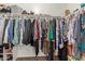 Walk-in closet features custom shelving and ample storage space for organizing your wardrobe at 6785 W Tether Trl, Peoria, AZ 85383