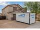 Two-story home with a spacious driveway and a two-car garage, complemented by desert landscaping at 6785 W Tether Trl, Peoria, AZ 85383