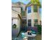 Charming front porch with a table, chairs, and a friendly welcome sign at 6785 W Tether Trl, Peoria, AZ 85383