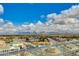 Incredible aerial view of the property, with a water feature and expansive landscape at 7181 E Camelback Rd # 208, Scottsdale, AZ 85251