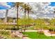 Beautifully landscaped grounds with palm trees, offering a tranquil outdoor space at 7181 E Camelback Rd # 208, Scottsdale, AZ 85251