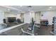 Functional gym with weightlifting machines, free weights, and a mirrored wall at 7181 E Camelback Rd # 208, Scottsdale, AZ 85251