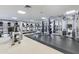 Modern gym with treadmills, weight machines and mirrored walls at 7181 E Camelback Rd # 208, Scottsdale, AZ 85251