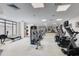 Bright gym with various cardio machines, weights, and ample space for workouts at 7181 E Camelback Rd # 208, Scottsdale, AZ 85251