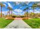 Scenic park view with lush grass and trees, creating a relaxing outdoor atmosphere at 7181 E Camelback Rd # 208, Scottsdale, AZ 85251