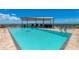 Stunning rooftop pool with a jacuzzi, lounge seating and panoramic city views at 7181 E Camelback Rd # 208, Scottsdale, AZ 85251