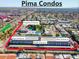 An aerial view of Pima Condos, showing the entrances, property, surrounding roads, and neighborhood at 7350 N Pima N Rd # 17, Scottsdale, AZ 85258