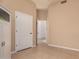 Bedroom featuring neutral tones, a doorway, and a large closet at 7955 E Chaparral Rd # 120, Scottsdale, AZ 85250