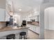 Open kitchen with breakfast bar, stainless appliances, and ample counter space at 7955 E Chaparral Rd # 120, Scottsdale, AZ 85250