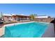Backyard pool view featuring refreshing turquoise water and fenced-in patio area, perfect for outdoor relaxation and enjoyment at 8107 E Mitchell Dr, Scottsdale, AZ 85251
