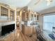 Bright dining area with wood cabinets, shelving, and a table that seats four at 903 S Mineshaft Dr, Apache Junction, AZ 85119