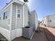 Exterior view featuring the side of the home with siding at 903 S Mineshaft Dr, Apache Junction, AZ 85119