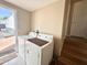 Laundry room featuring washer and dryer with stair access to the upper level at 903 S Mineshaft Dr, Apache Junction, AZ 85119