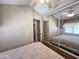 Comfortable main bedroom features a ceiling fan, plenty of built in cabinet and mirrored closet at 903 S Mineshaft Dr, Apache Junction, AZ 85119