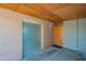 Attached carport features brick and metal finishes with a wooden door at 920 S Ash Ave, Tempe, AZ 85281