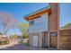 Exterior shot with mixed textures: metal siding, brick, and wood accents at 920 S Ash Ave, Tempe, AZ 85281