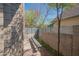 Exterior shot of a patio with a bench surrounded by greenery, creating a serene outdoor space at 920 S Ash Ave, Tempe, AZ 85281
