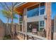 Modern exterior showcasing large windows and a cozy outdoor seating area on the front porch at 920 S Ash Ave, Tempe, AZ 85281