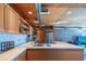 Modern kitchen featuring stainless steel appliances, wood cabinets and hardwood ceiling at 920 S Ash Ave, Tempe, AZ 85281