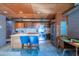 Well-equipped kitchen with island, stainless steel appliances, and seamless design with the dining area at 920 S Ash Ave, Tempe, AZ 85281