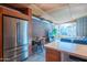 Bright, modern living room featuring stainless steel refrigerator and dining area at 920 S Ash Ave, Tempe, AZ 85281