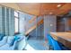 Modern living room featuring a staircase, hardwood ceilings, and an open-concept layout at 920 S Ash Ave, Tempe, AZ 85281