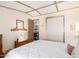 Bedroom with ample storage, comfortable bed, and neutral tones for a relaxing atmosphere at 9828 E Pueblo Ave # 113, Mesa, AZ 85208