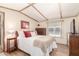 Cozy bedroom with wooden trim, comfortable bed, and neutral tones for a relaxing atmosphere at 9828 E Pueblo Ave # 113, Mesa, AZ 85208