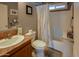 Bathroom featuring a sink, toilet, and shower with modern fixtures at 11596 W Sierra Dawn Blvd # 293, Surprise, AZ 85378