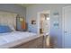Comfortable bedroom with a wooden bed frame and decor at 11596 W Sierra Dawn Blvd # 293, Surprise, AZ 85378