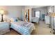 Charming bedroom with cozy bed, decorative accents, and ample mirror at 11596 W Sierra Dawn Blvd # 293, Surprise, AZ 85378