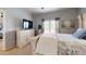 Bright bedroom featuring a decorative dresser and plush bedding at 11596 W Sierra Dawn Blvd # 293, Surprise, AZ 85378