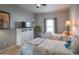 Cozy bedroom with two twin beds, dresser, and TV at 11596 W Sierra Dawn Blvd # 293, Surprise, AZ 85378