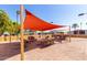 Inviting community patio with lounge seating and shade sails, perfect for relaxing outdoors at 11596 W Sierra Dawn Blvd # 293, Surprise, AZ 85378