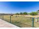 Fenced community dog park features agility equipment, creating a fun and safe space for pets at 11596 W Sierra Dawn Blvd # 293, Surprise, AZ 85378