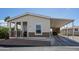 Charming single-story home with a covered parking area and cozy front porch at 11596 W Sierra Dawn Blvd # 293, Surprise, AZ 85378
