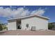 Exterior shot of home featuring low maintenance landscaping with a back patio at 11596 W Sierra Dawn Blvd # 293, Surprise, AZ 85378