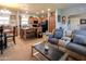 Cozy living room offering comfortable seating and seamless flow to the kitchen and dining areas at 11596 W Sierra Dawn Blvd # 293, Surprise, AZ 85378
