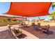 Inviting outdoor patio area with stylish seating arrangements, providing a comfortable space for relaxation and socializing at 11596 W Sierra Dawn Blvd # 293, Surprise, AZ 85378