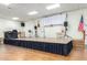 View of stage area, showcasing a music-themed setup, American flag and ample space for activities and performances at 11596 W Sierra Dawn Blvd # 293, Surprise, AZ 85378