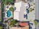 Aerial view of a home featuring a pristine backyard pool, patio and beautiful desert landscaping at 15755 E Palomino Blvd, Fountain Hills, AZ 85268