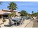 Expansive backyard featuring a pool, patio, and lush landscaping perfect for outdoor living and entertainment at 15755 E Palomino Blvd, Fountain Hills, AZ 85268