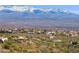 Scenic view of a desert community with mountain views in the distance at 15755 E Palomino Blvd, Fountain Hills, AZ 85268