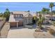 Beautiful two-story home with a tile roof, desert landscaping, and a two-car garage at 15755 E Palomino Blvd, Fountain Hills, AZ 85268