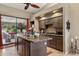 Well-lit kitchen features granite countertops and dark wood cabinets with a center island at 15755 E Palomino Blvd, Fountain Hills, AZ 85268