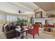 Comfortable living room with a fireplace, plush seating, and natural lighting at 15755 E Palomino Blvd, Fountain Hills, AZ 85268
